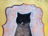 gato con alfombra